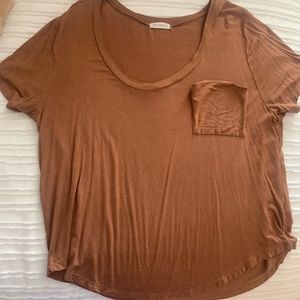 Boutique top!! Size medium but could fit a small.